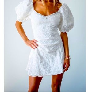 Never worn in original packaging, The Donelli Dress, white, size Medium.